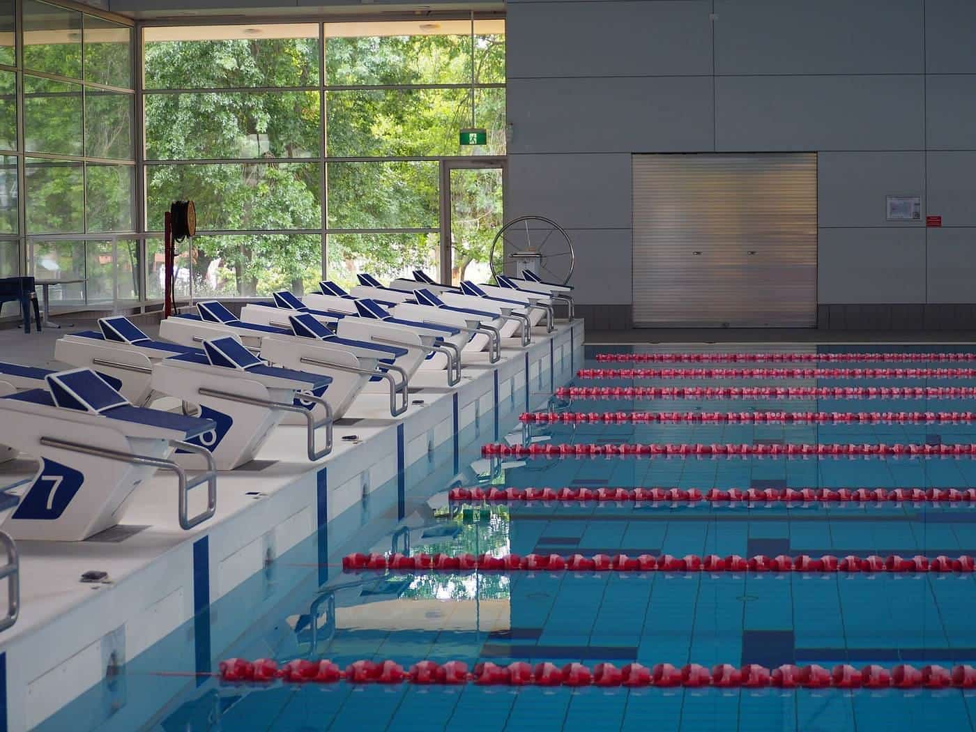 Lanes and starting blocks at an indoor swimming pool